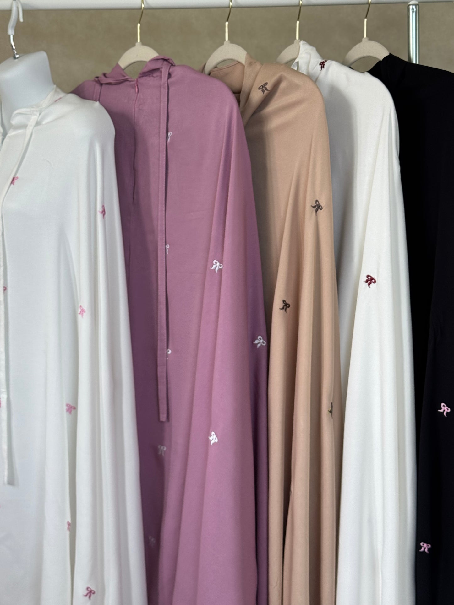 Delicate and dreamy prayer wear designed with coquette charm and elegant modesty